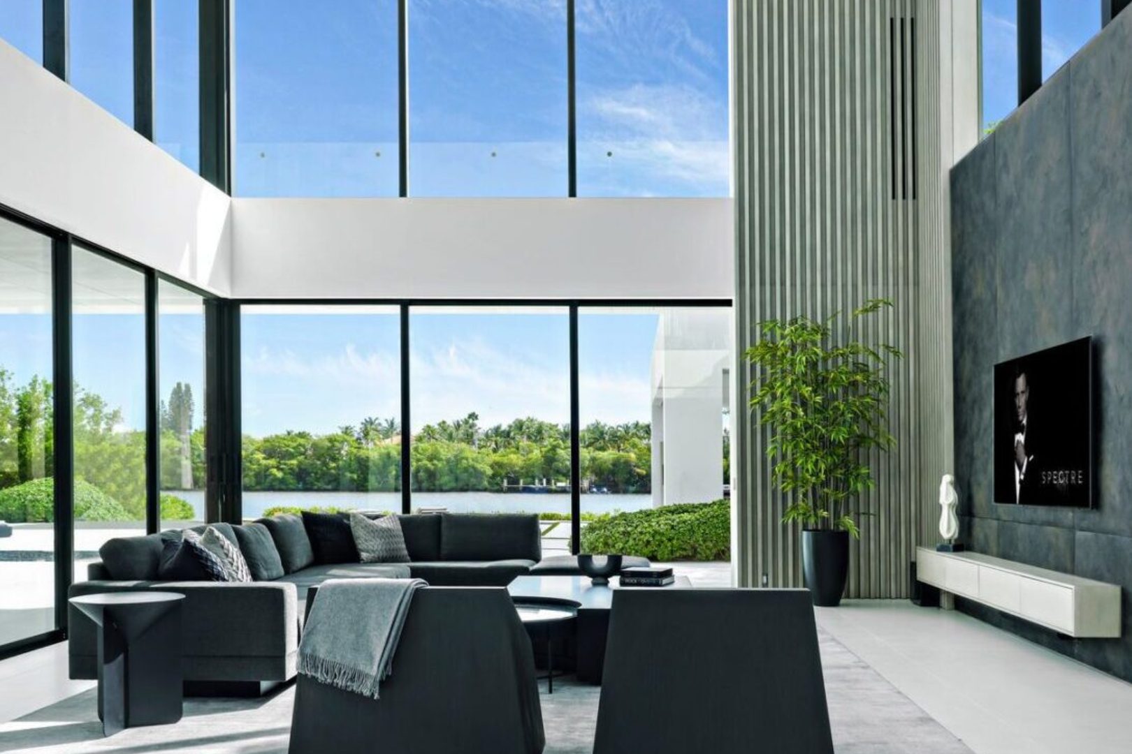 Modern living room with large windows.