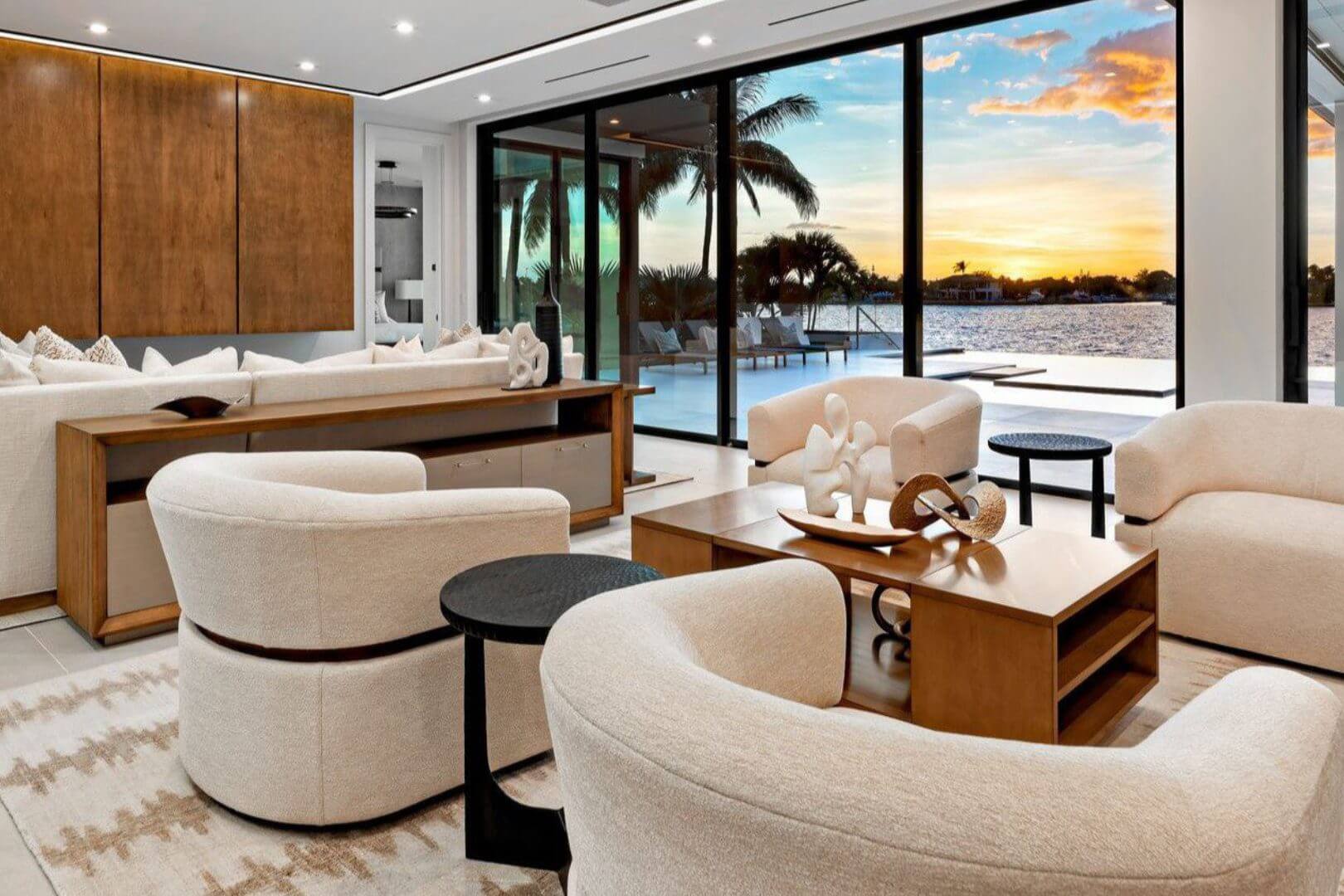 Modern living room with sunset view.