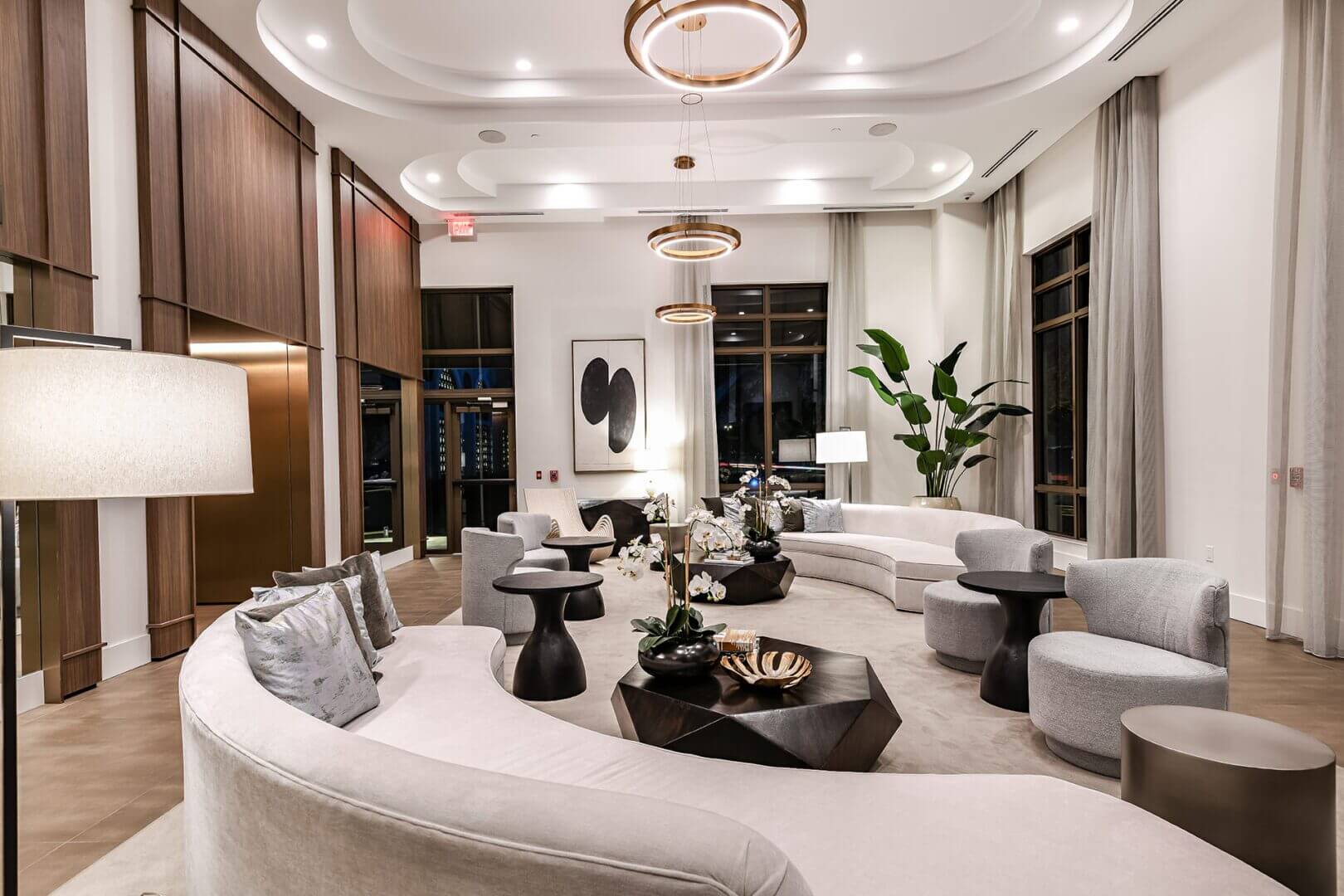 Modern lounge with elegant seating and decor.