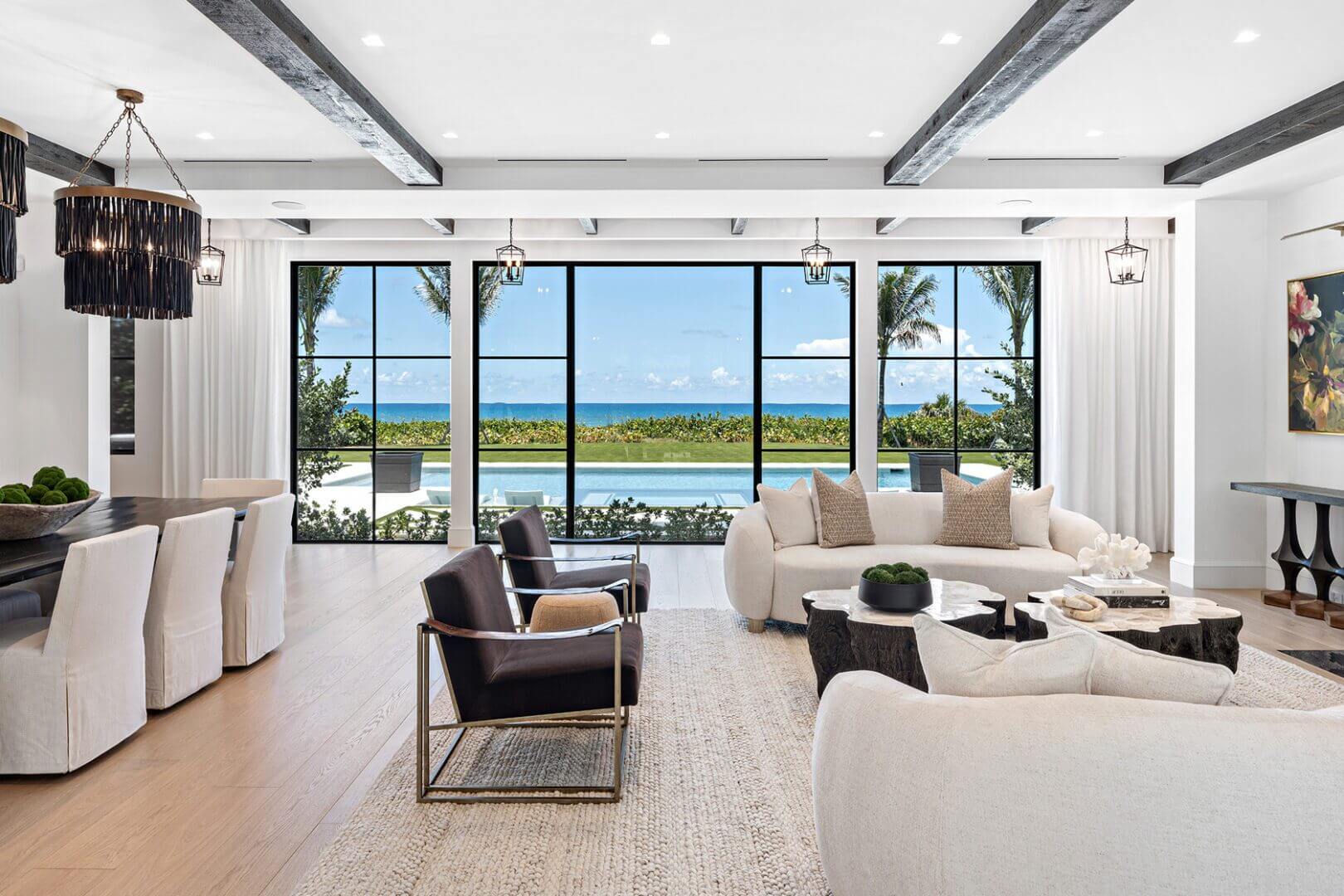 Modern living room with ocean view windows.