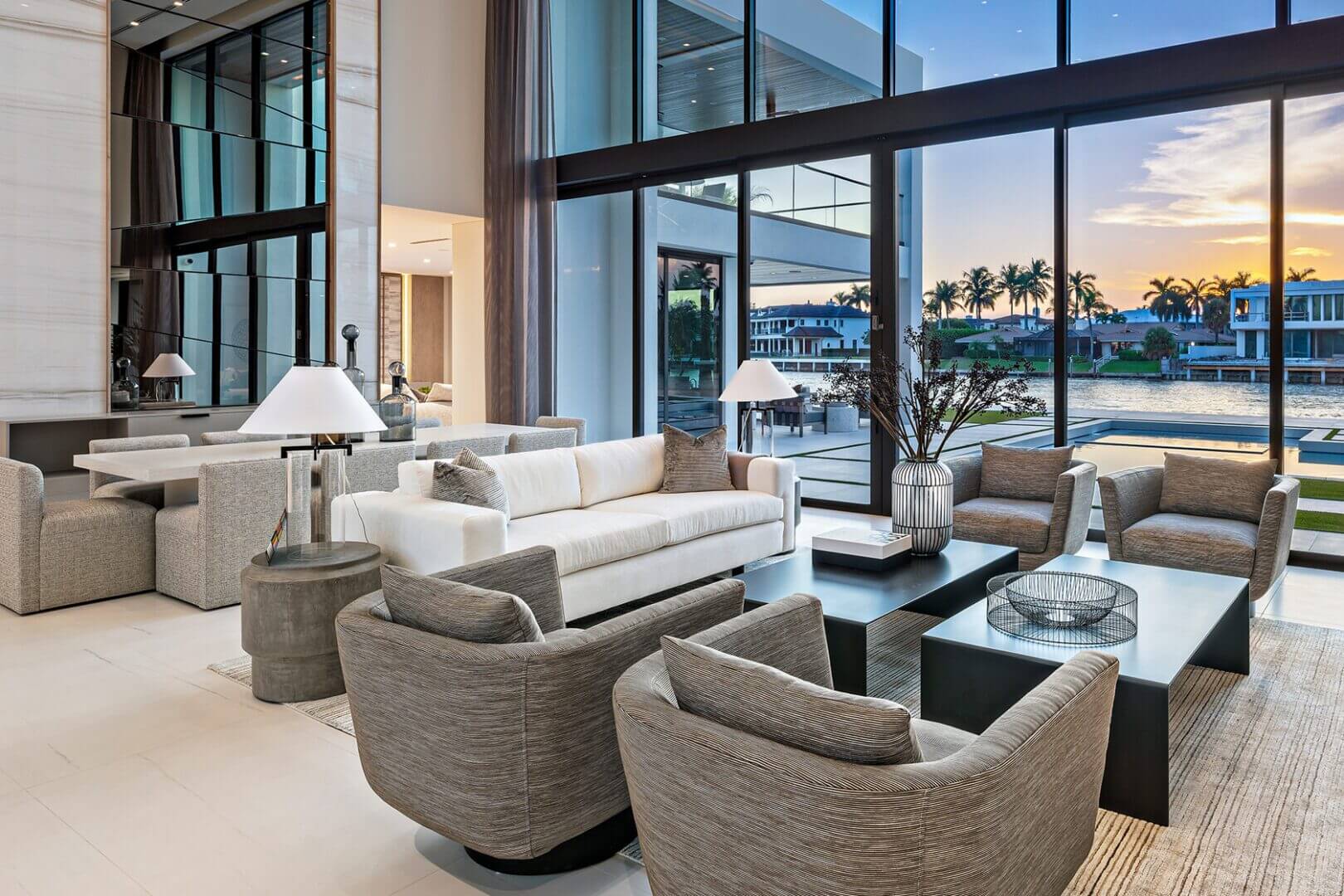 Luxurious living room with waterfront view.